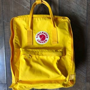 Fjallraven Kanken yellow backpack